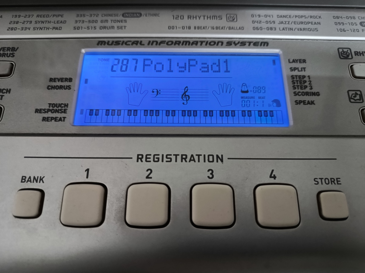 A close-up of the CTK810-IN keyboard showing the registration memory buttons